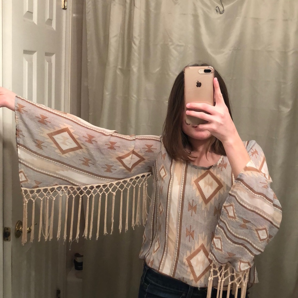Blouse with tassels